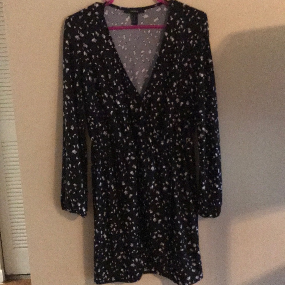 Short, black dress with white and gray. Never worn